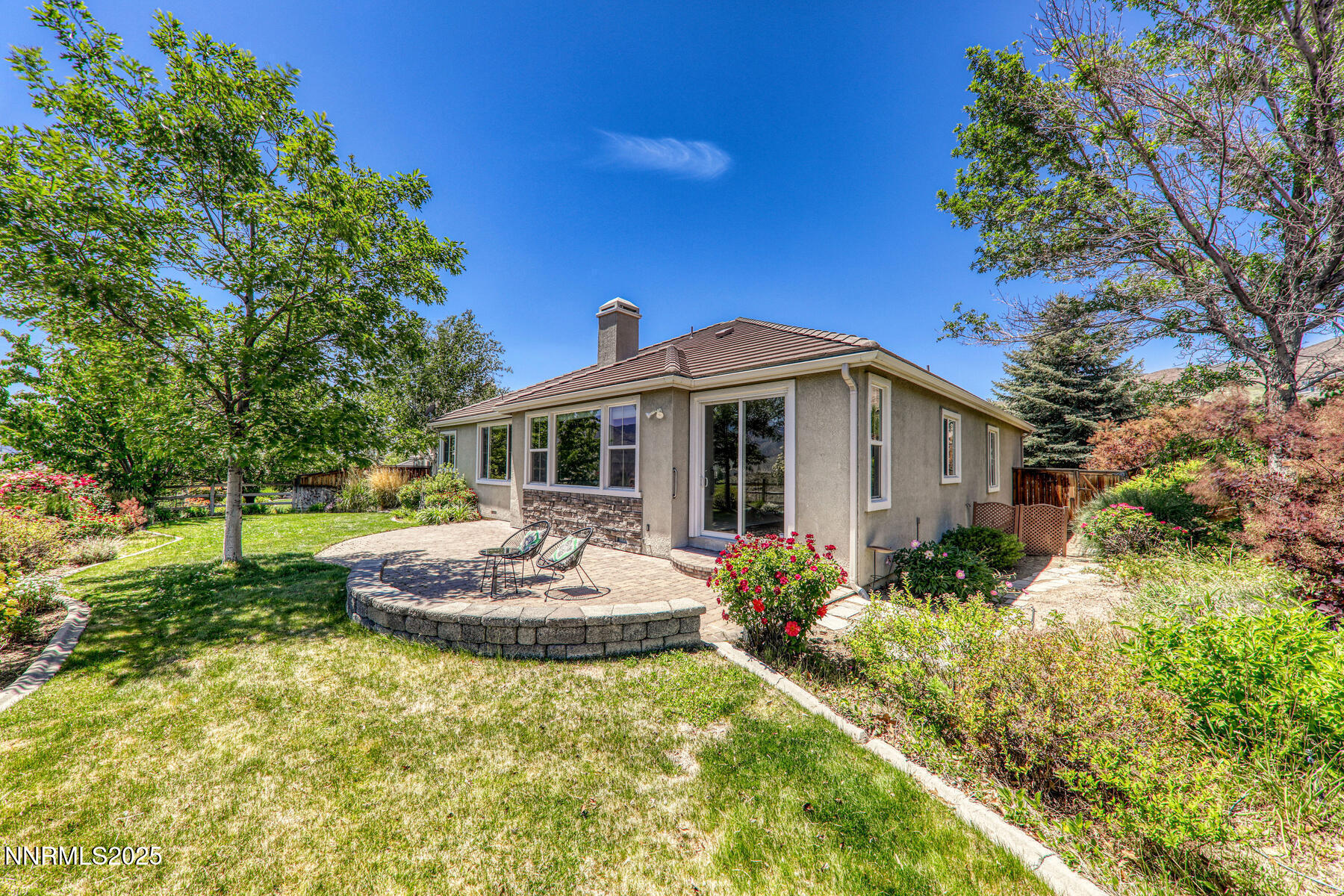 8890 Chipshot Trail Reno, NV 89523 - Photo 3 of 36 a front view of house with a garden