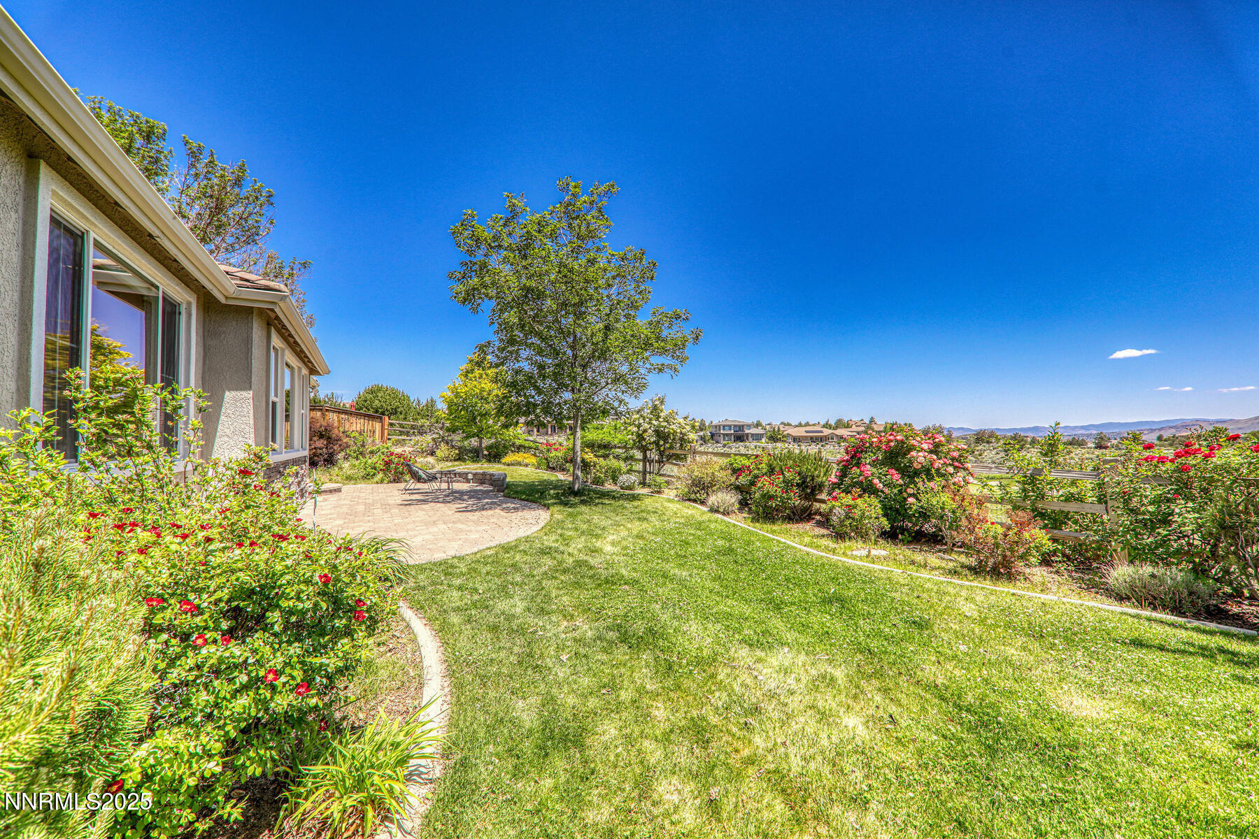 8890 Chipshot Trail Reno, NV 89523 - Photo 4 of 36 a view of an outdoor space and a yard