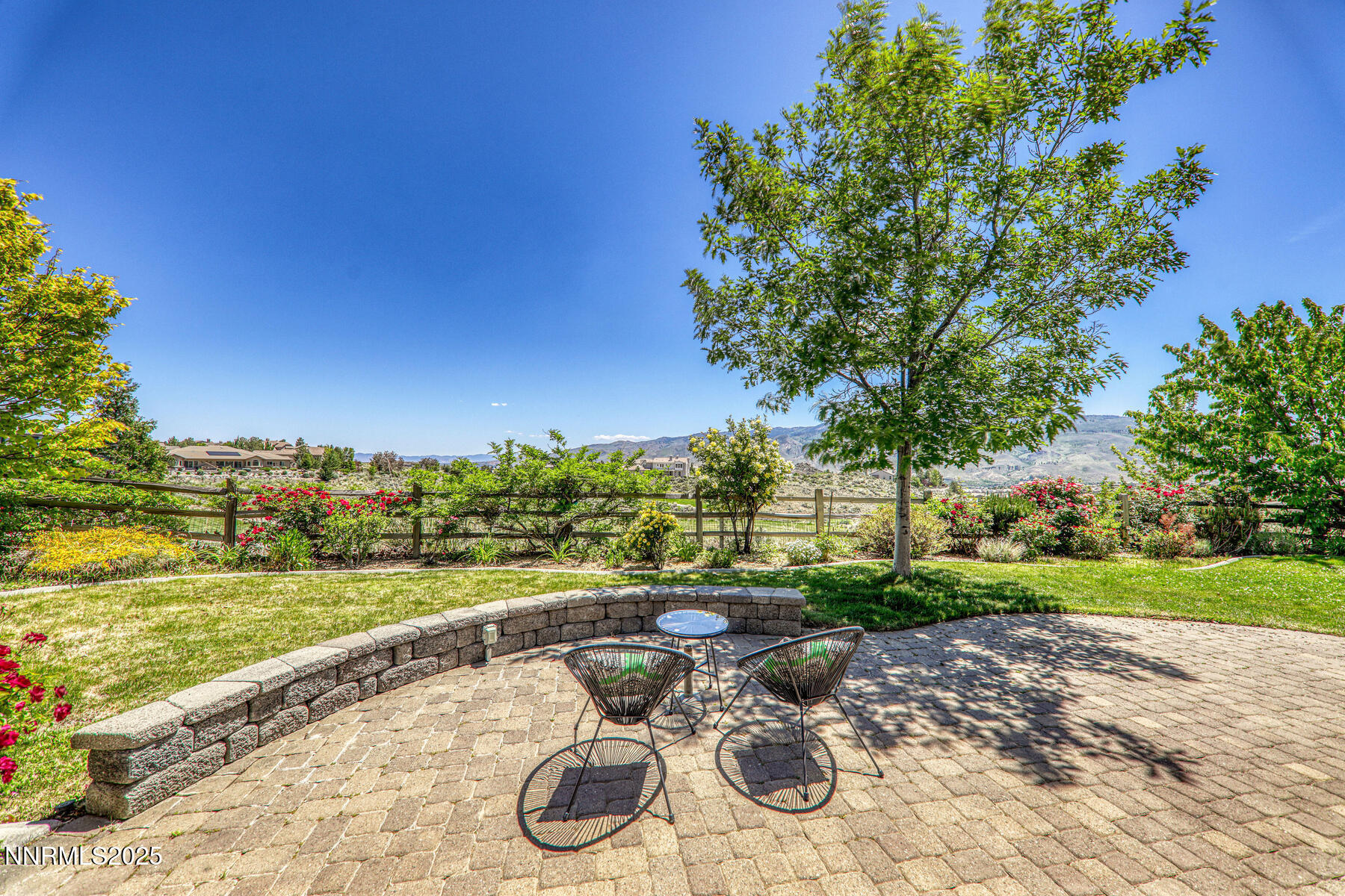 8890 Chipshot Trail Reno, NV 89523 - Photo 7 of 36 a view of a lake with a yard