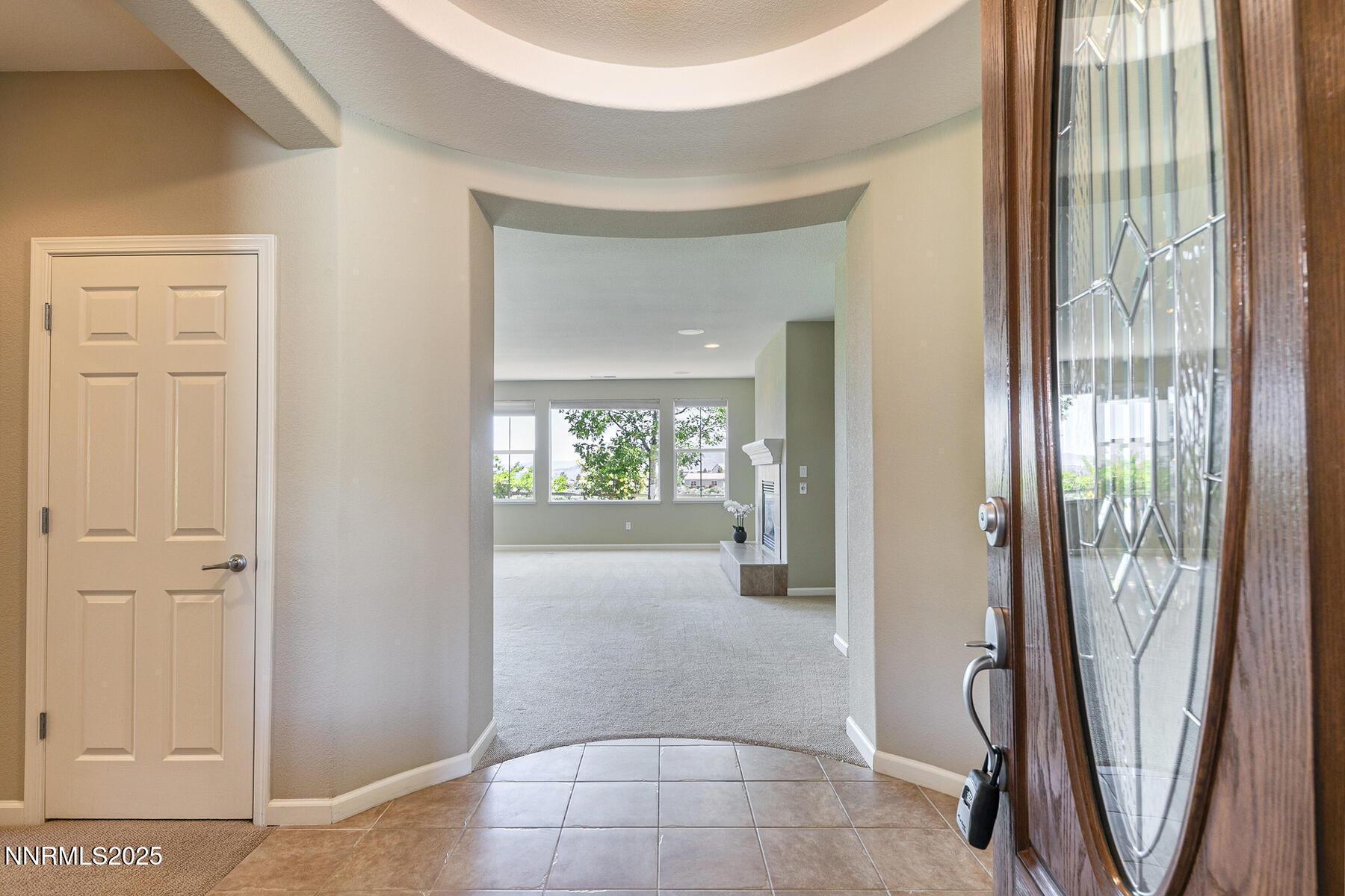 8890 Chipshot Trail Reno, NV 89523 - Photo 10 of 36 a view of a hallway with a livingroom and furniture