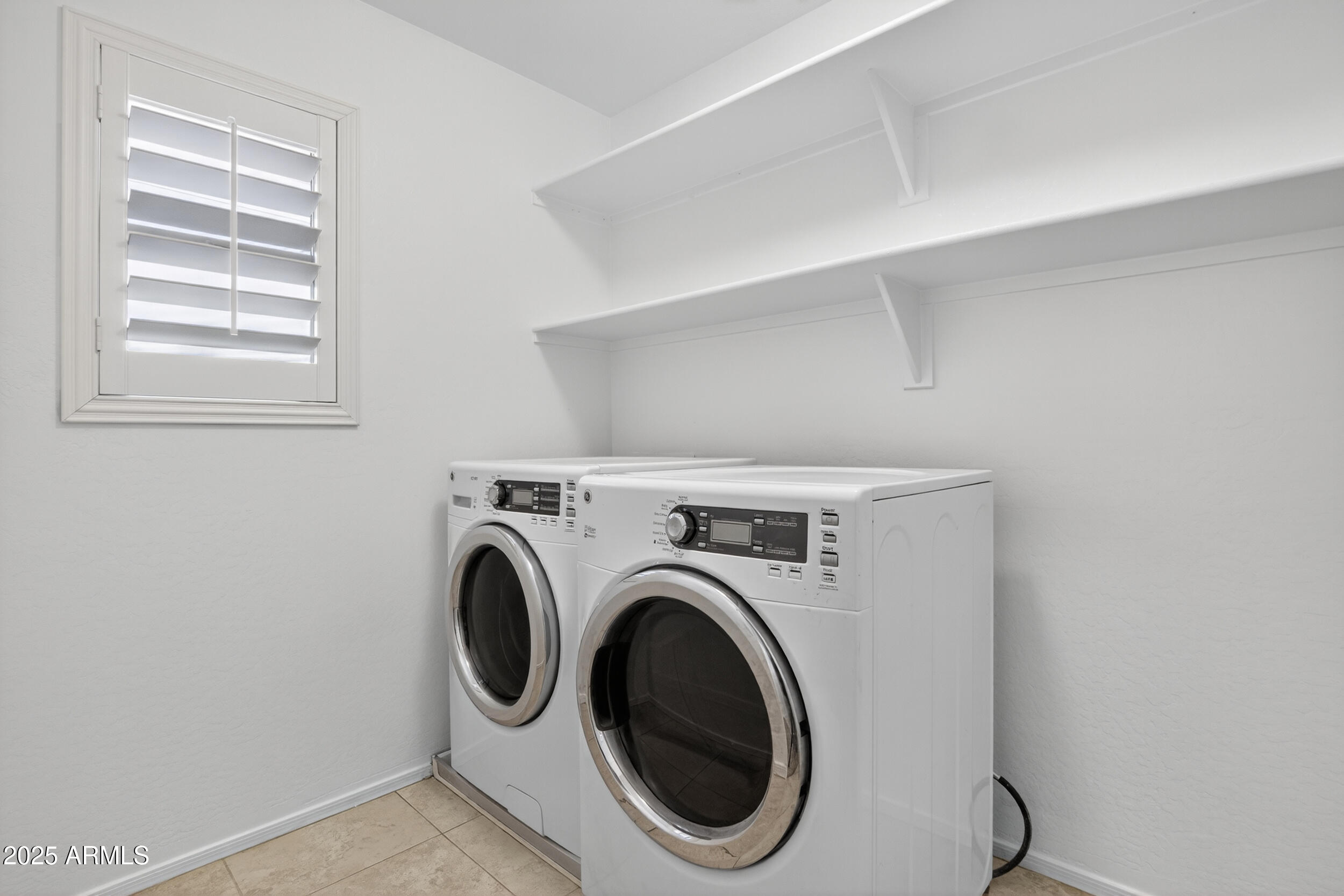 2565 East Southern Avenue, Unit 135 Mesa, AZ 85204 - Photo 14 of 32 a utility room with dryer and washer