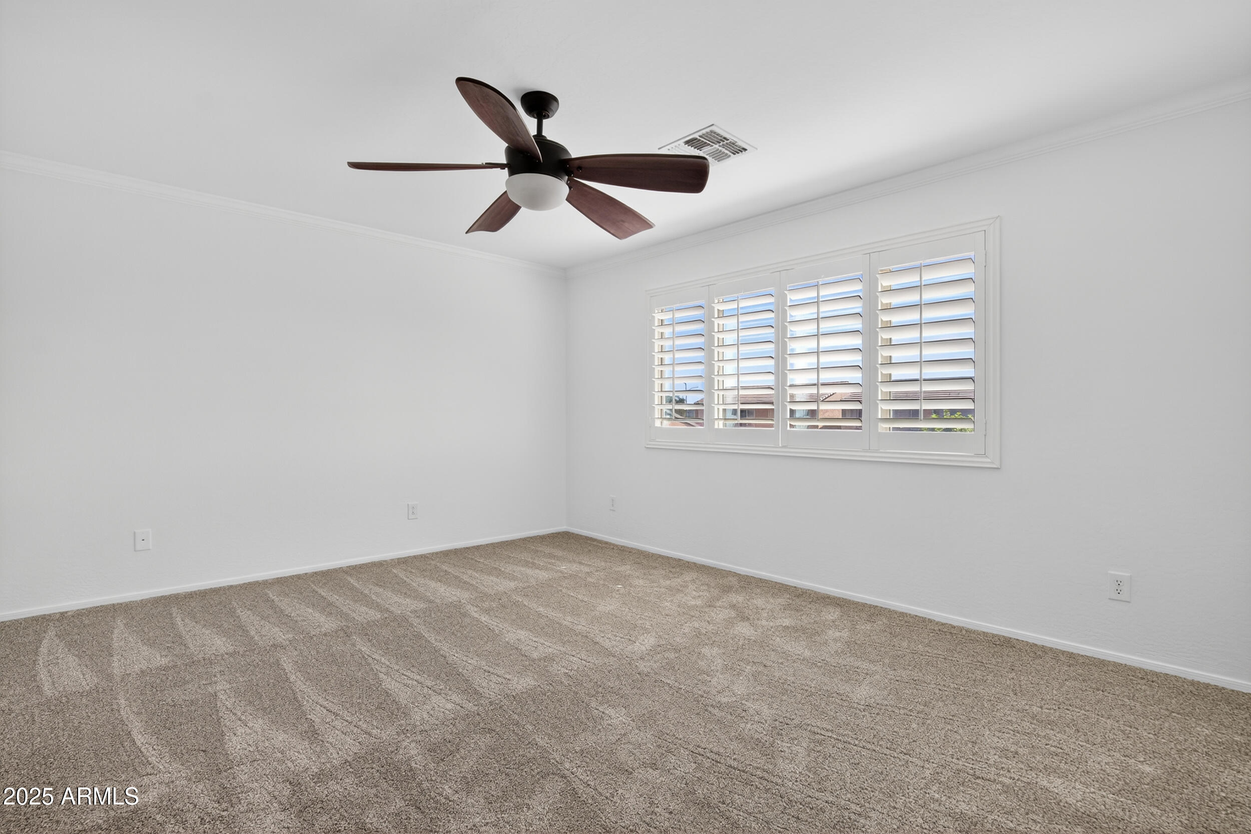 2565 East Southern Avenue, Unit 135 Mesa, AZ 85204 - Photo 26 of 32 a view of an empty room with a window