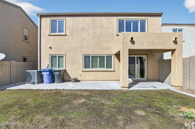 swimming pool view with a seating space