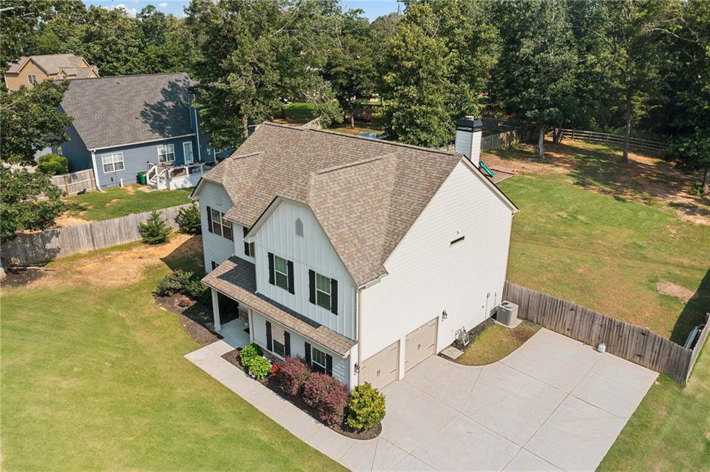 13 Four Feathers Lane Northeast Rydal, GA 30171 - Photo 5 of 51 an aerial view of a house with swimming pool