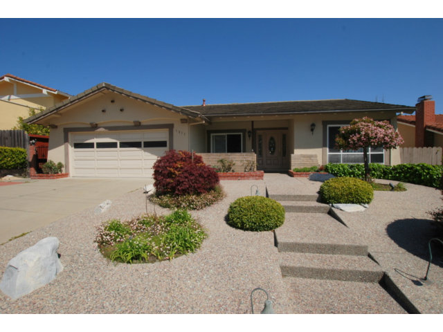 1811 Randall Road San Mateo, CA 94402 - Photo 1 of 21 a front view of a house with garden