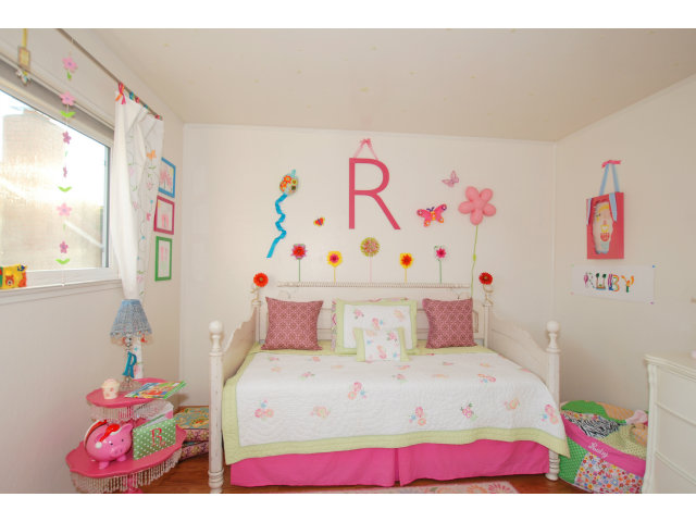 1811 Randall Road San Mateo, CA 94402 - Photo 11 of 21 a bedroom with furniture and a bed