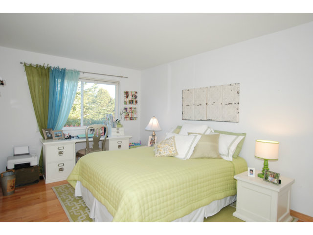 1811 Randall Road San Mateo, CA 94402 - Photo 12 of 21 a bedroom with a bed and a window
