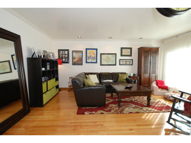 1811 Randall Road San Mateo, CA 94402 - Photo 2 of 21 a living room with furniture and a flat screen tv