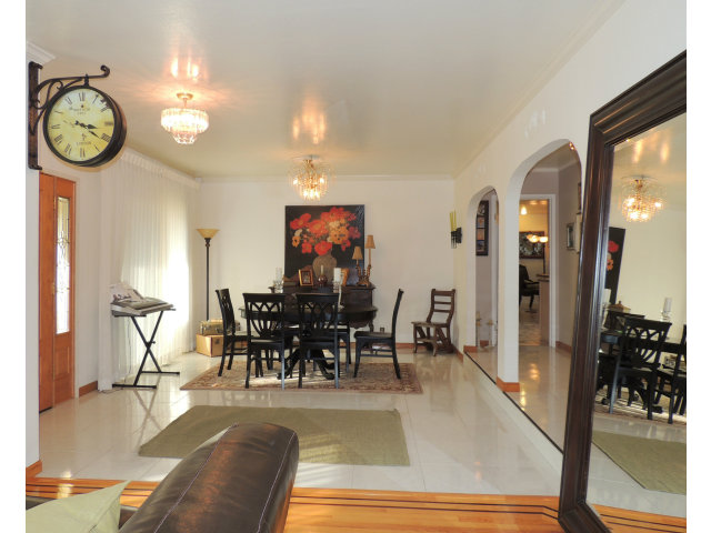 1811 Randall Road San Mateo, CA 94402 - Photo 4 of 21 a view of a dining room with furniture window and wooden floor