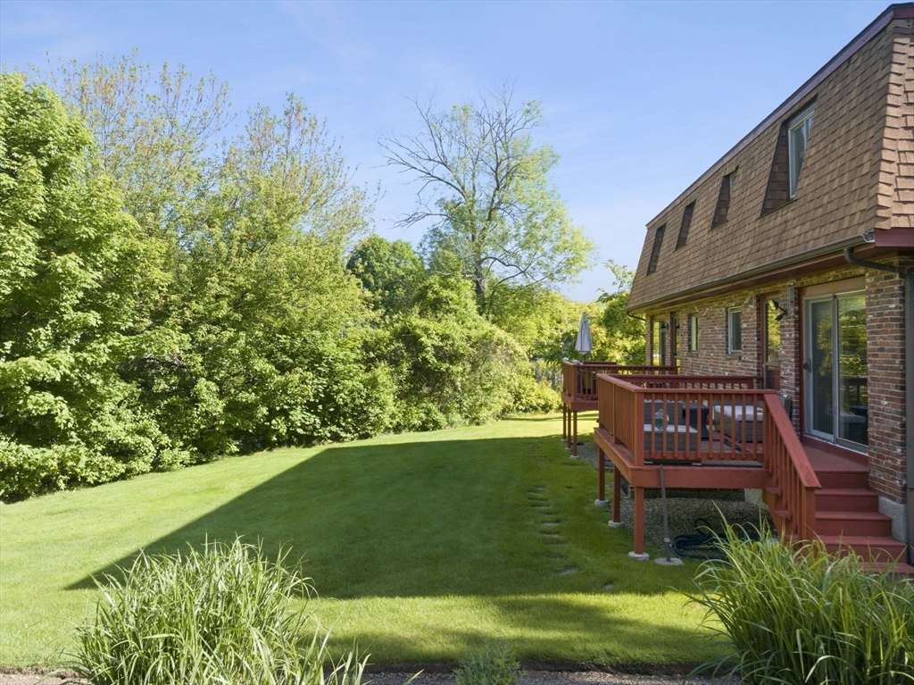 212 Washington Street, Unit 212 Canton, MA 02021 - Photo 35 of 35 a view of a house with a yard