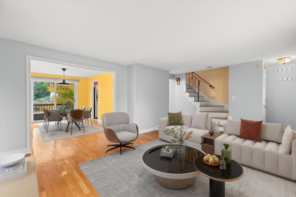 212 Washington Street, Unit 212 Canton, MA 02021 - Photo 5 of 35 a living room with furniture and a large window