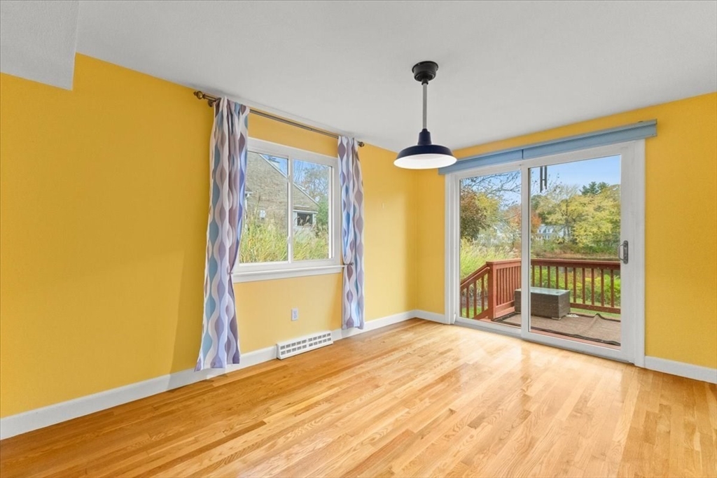 212 Washington Street, Unit 212 Canton, MA 02021 - Photo 7 of 35 a view of an empty room with a window