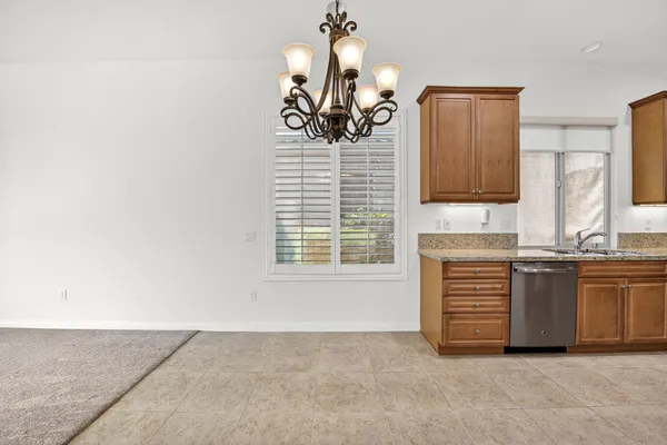 a view of kitchen and windows