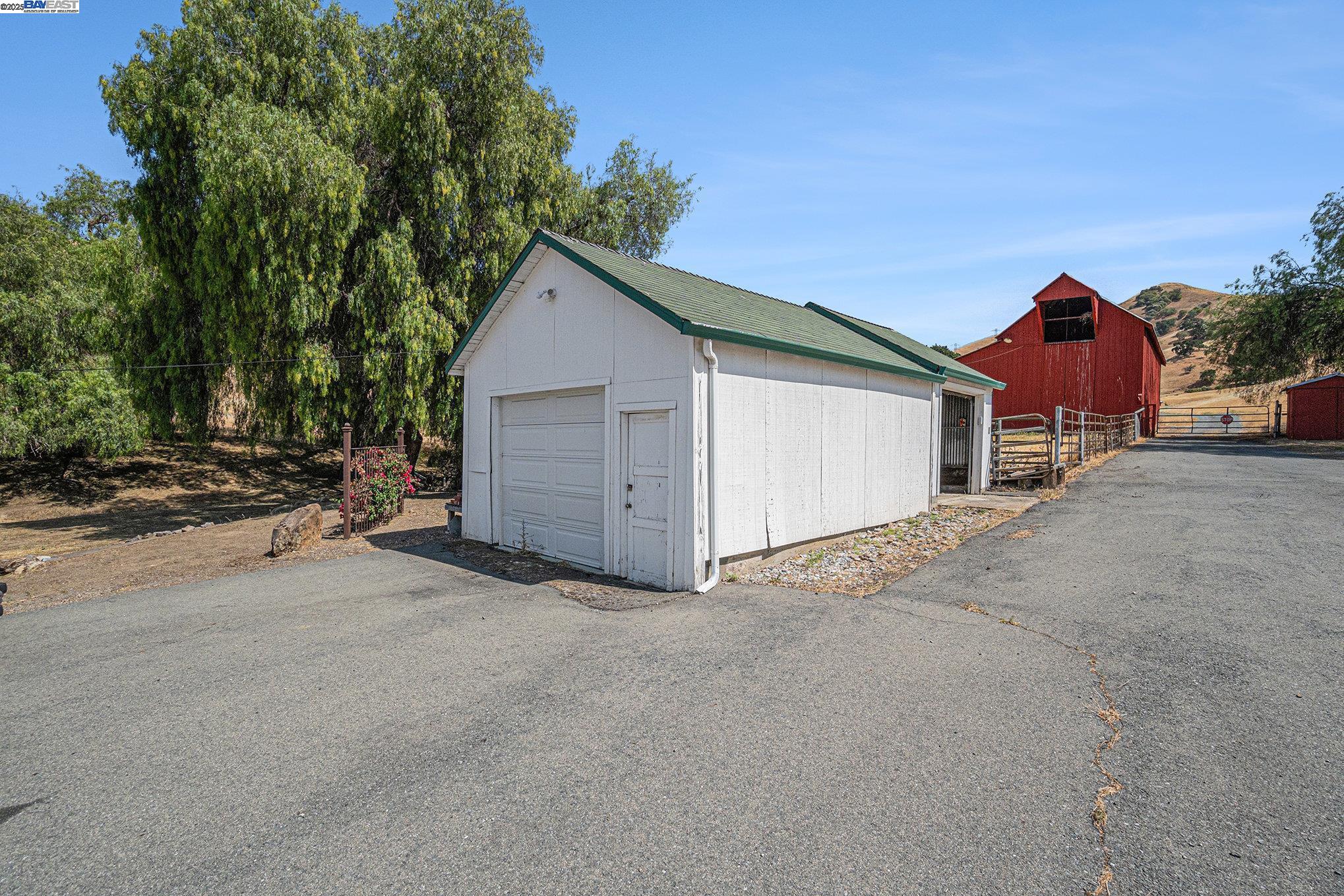 5799 Nortonville Road Pittsburg, CA 94565 - Photo 37 of 59 a view of a house with a garage and a garage