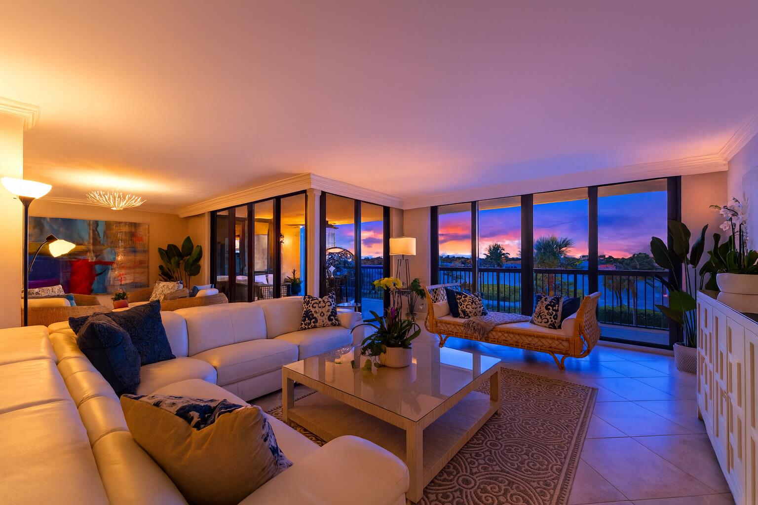 19670 South Beach Road, Unit B303 Jupiter, FL 33469 - Photo 103 of 104 a living room with furniture a rug and a large window