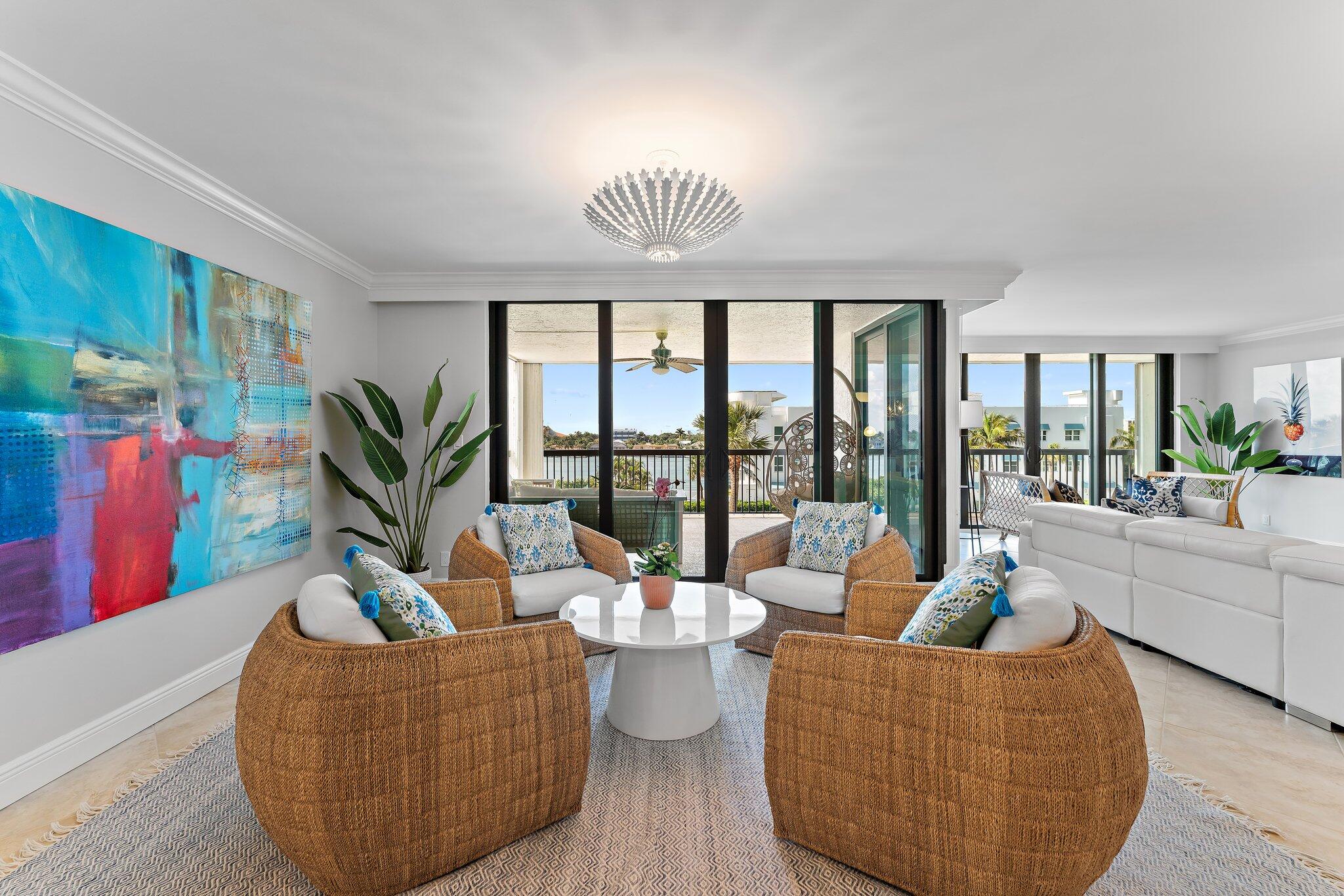 19670 South Beach Road, Unit B303 Jupiter, FL 33469 - Photo 16 of 104 a living room with furniture and a large window