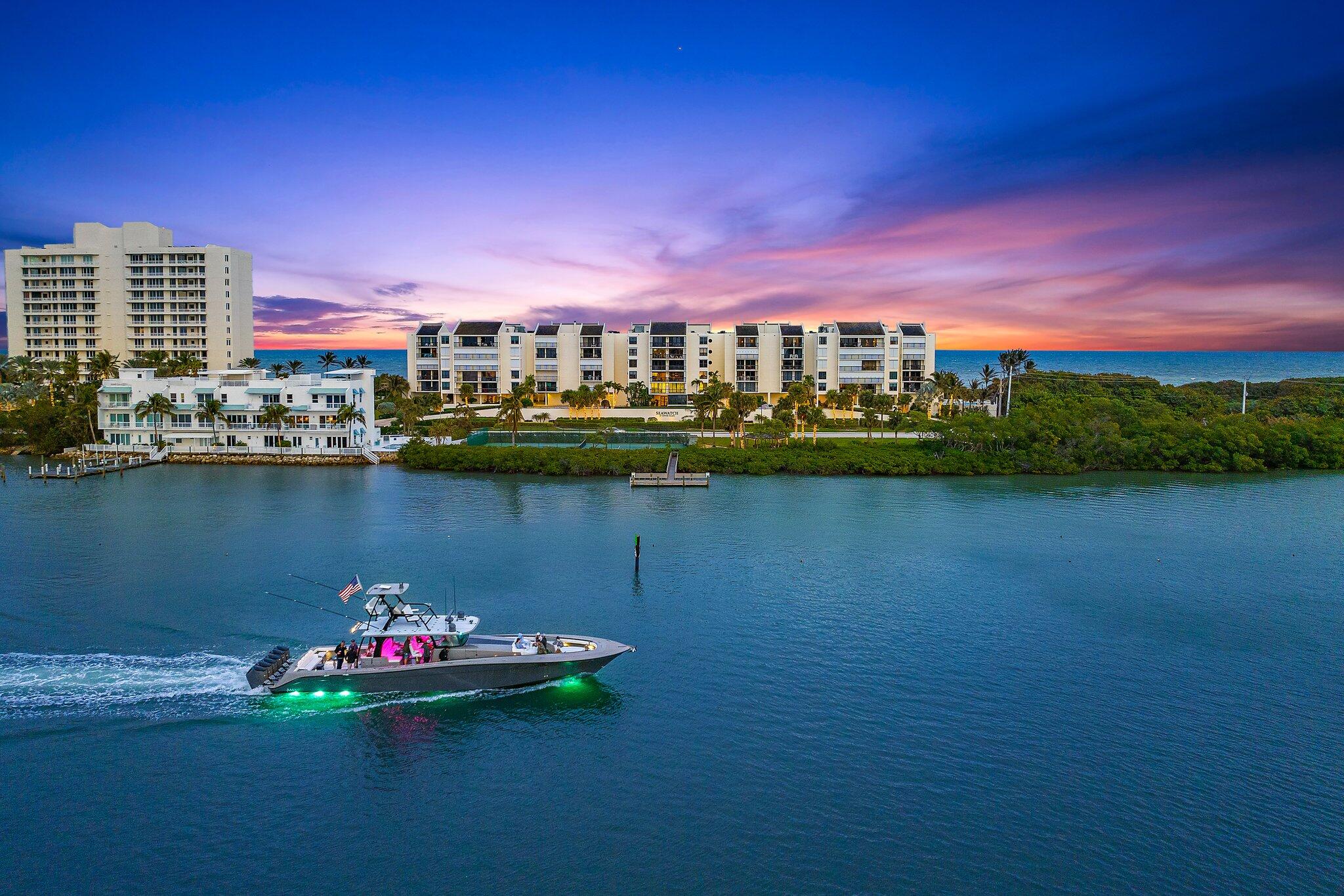 19670 South Beach Road, Unit B303 Jupiter, FL 33469 - Photo 92 of 104 a view of a lake with a large mountain