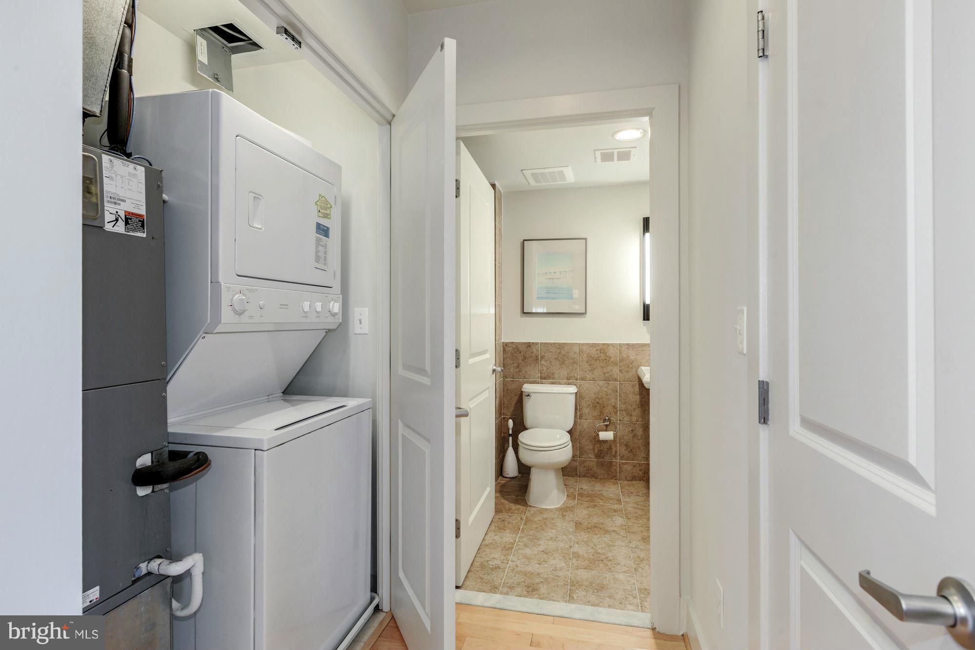 2301 Champlain Street Northwest, Unit 112 Washington, DC 20009 - Photo 18 of 29 a bathroom with a toilet and a sink