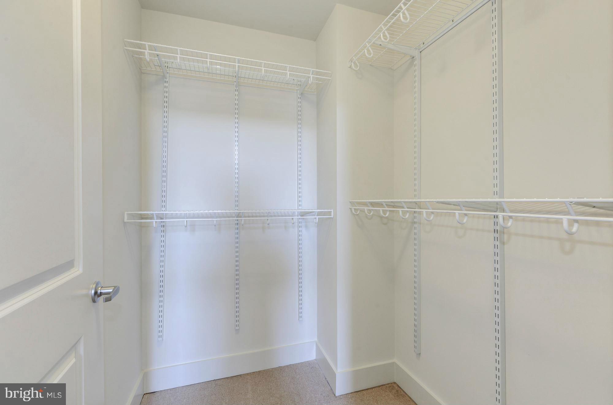 2301 Champlain Street Northwest, Unit 112 Washington, DC 20009 - Photo 24 of 29 a bathroom with a glass shower door