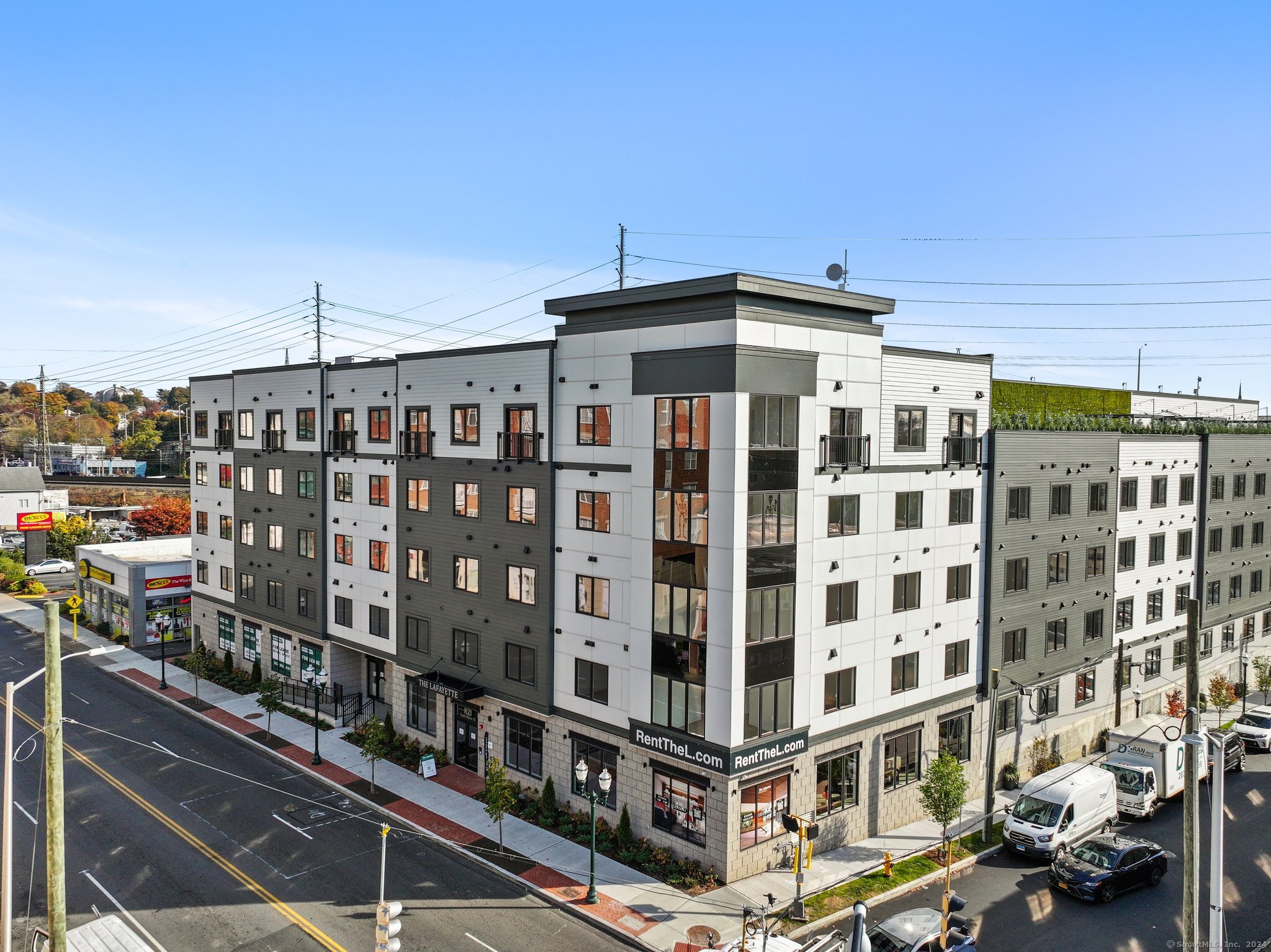 821 East Main Street, Unit 209 Stamford, CT 06902 - Photo 2 of 29 a front view of a building with glass windows