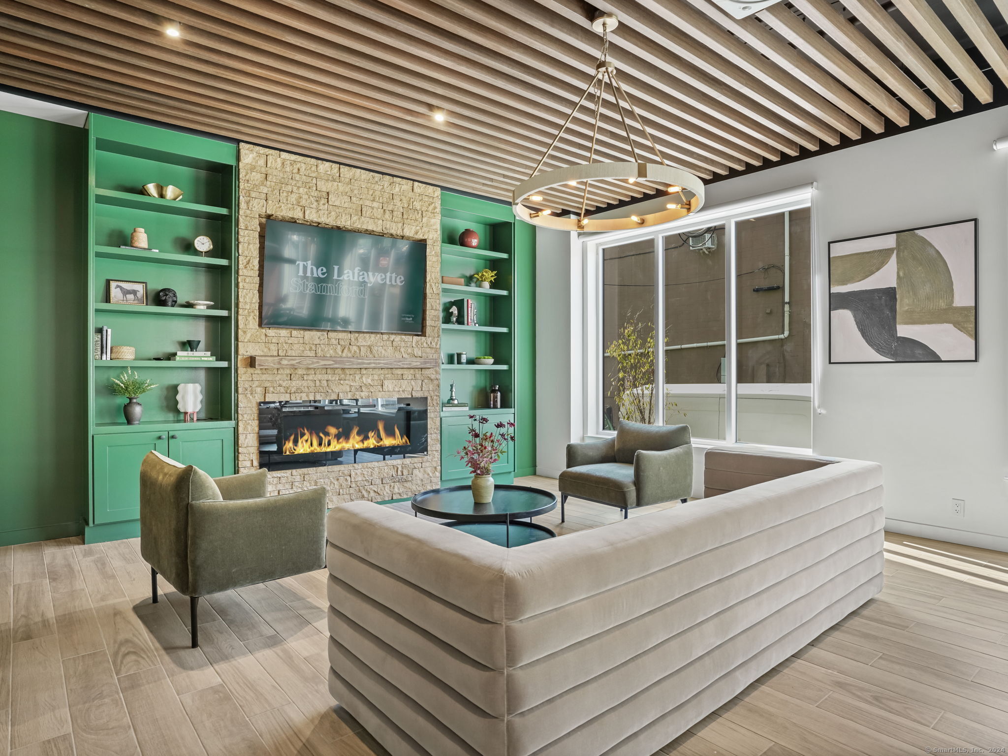 821 East Main Street, Unit 209 Stamford, CT 06902 - Photo 3 of 29 a living room with furniture and a fireplace