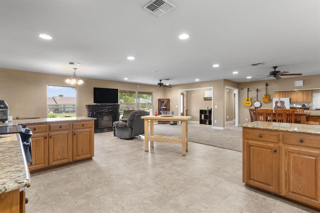 4504 Jennings Avenue Wichita Falls, TX 76310 - Photo 9 of 26 a large white kitchen with stainless steel appliances