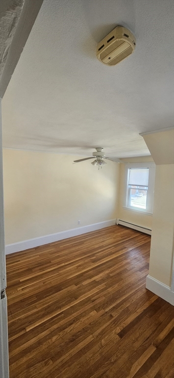 22 Endicott Street, Unit 3 Norwood, MA 02062 - Photo 14 of 22 a view of an empty room and a window
