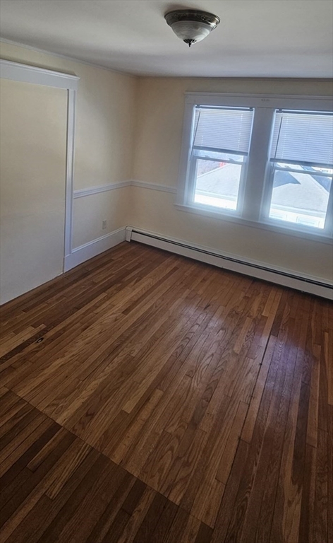 22 Endicott Street, Unit 3 Norwood, MA 02062 - Photo 7 of 22 a view of an empty room and window
