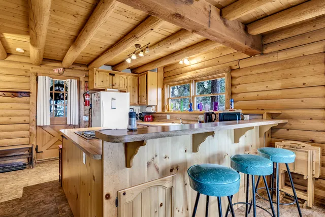 a outdoor space with lots of chairs and a shower