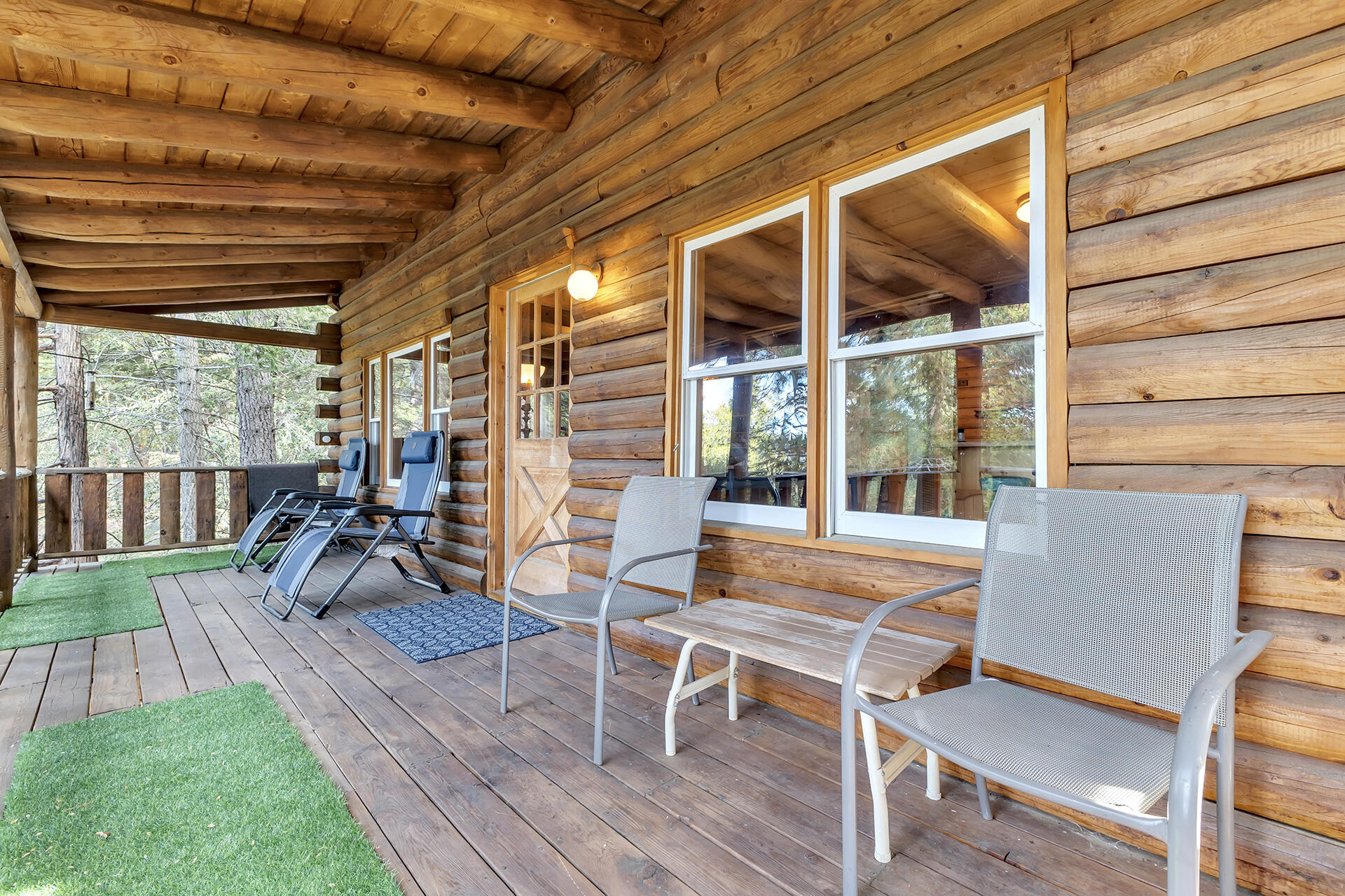 25121 Pine Cove Road Idyllwild, CA 92549 - Photo 28 of 65 a living room filled with furniture and a wooden floor