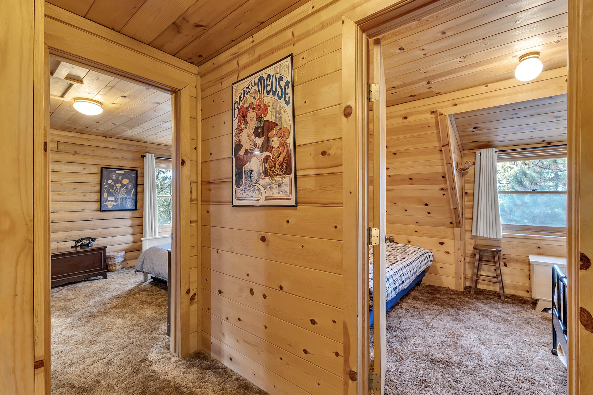 25121 Pine Cove Road Idyllwild, CA 92549 - Photo 34 of 65 a view of bedroom with a large bed and a closet