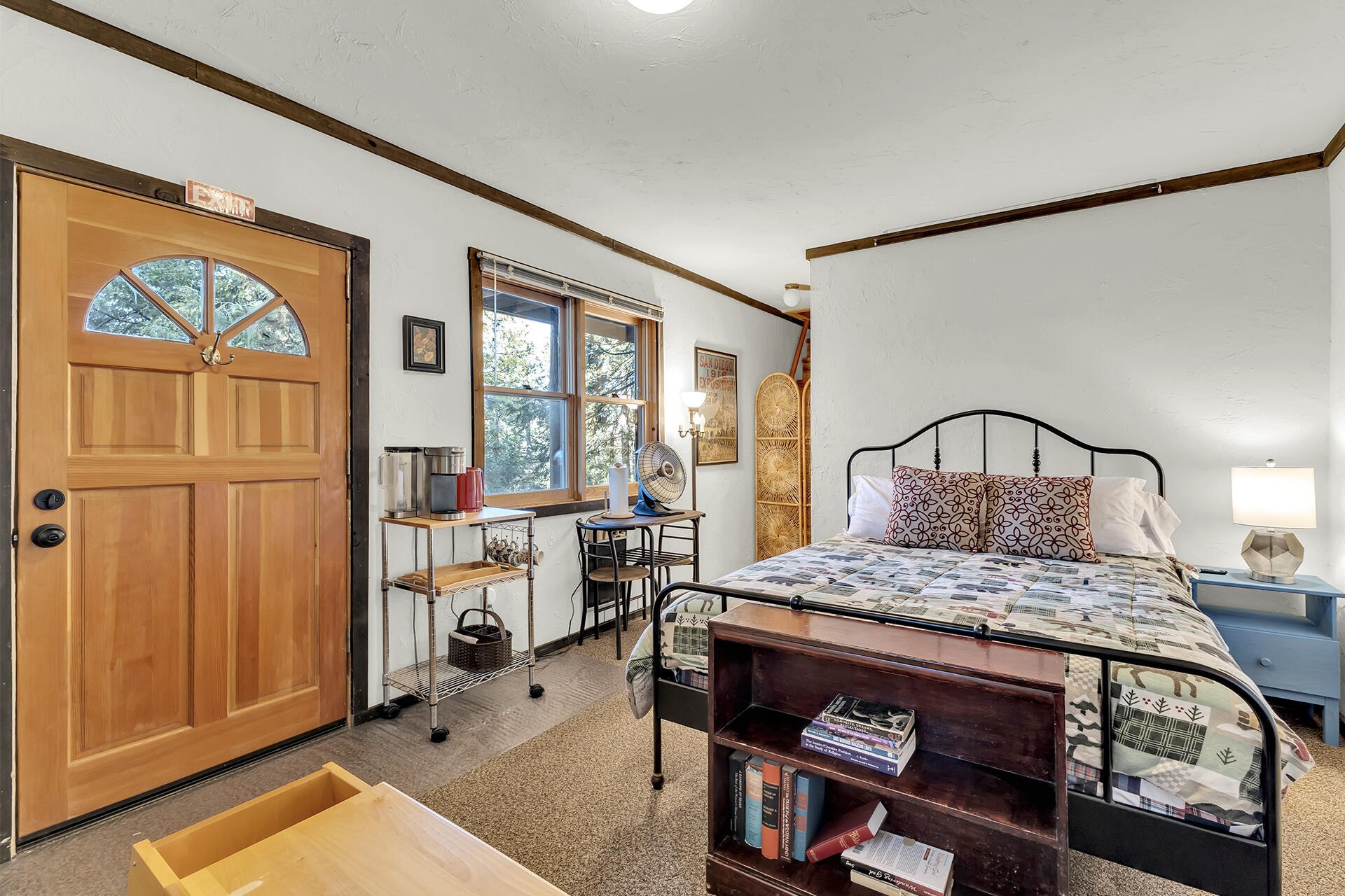 25121 Pine Cove Road Idyllwild, CA 92549 - Photo 53 of 65 a bedroom with furniture and a window
