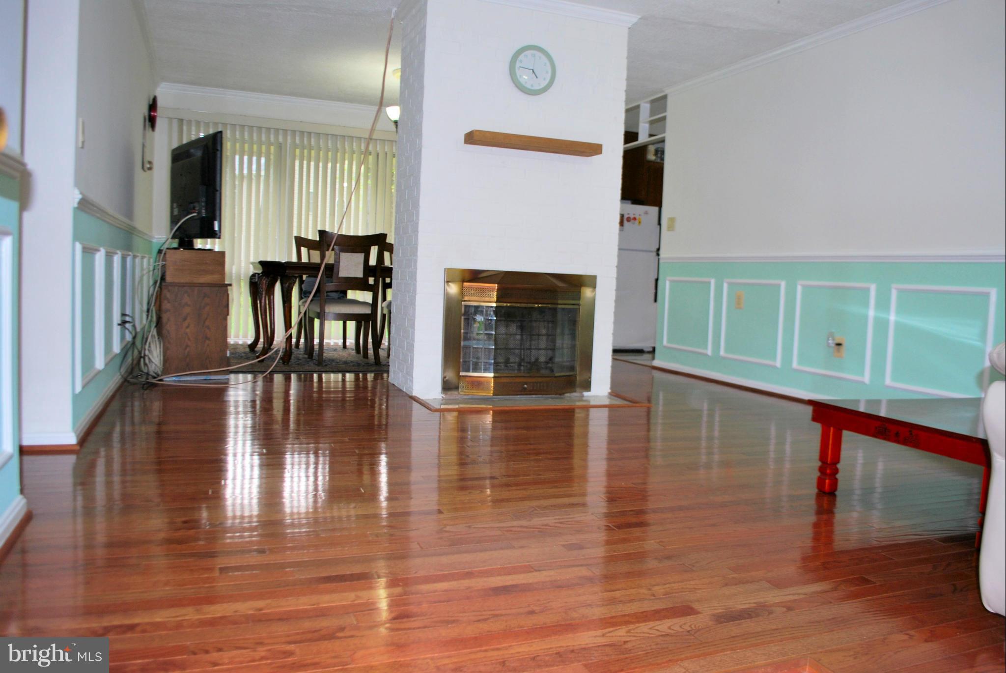 5536 Belfast Place Springfield, VA 22151 - Photo 14 of 30 Living Room w/wood burning Fireplace