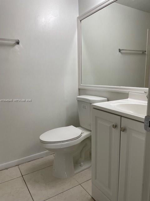 5612 Rock Island Road, Unit 167 Tamarac, FL 33319 - Photo 12 of 16 a white toilet sitting next to a shower