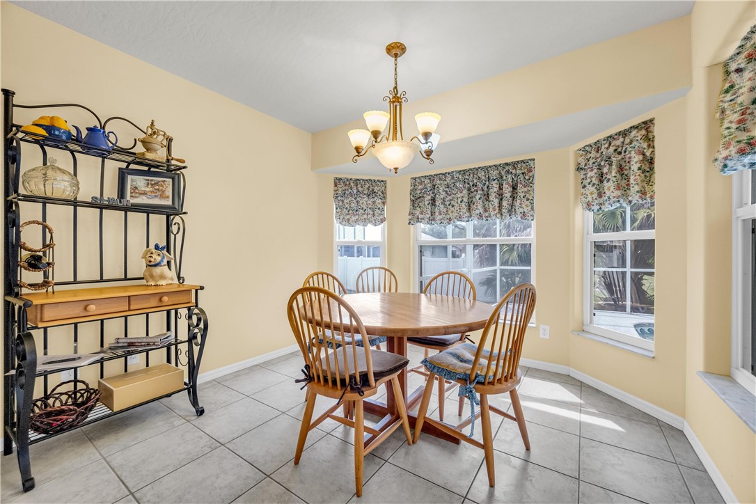 1641 Laconia Street Sebastian, FL 32958 - Photo 17 of 32 a dining room with furniture and window