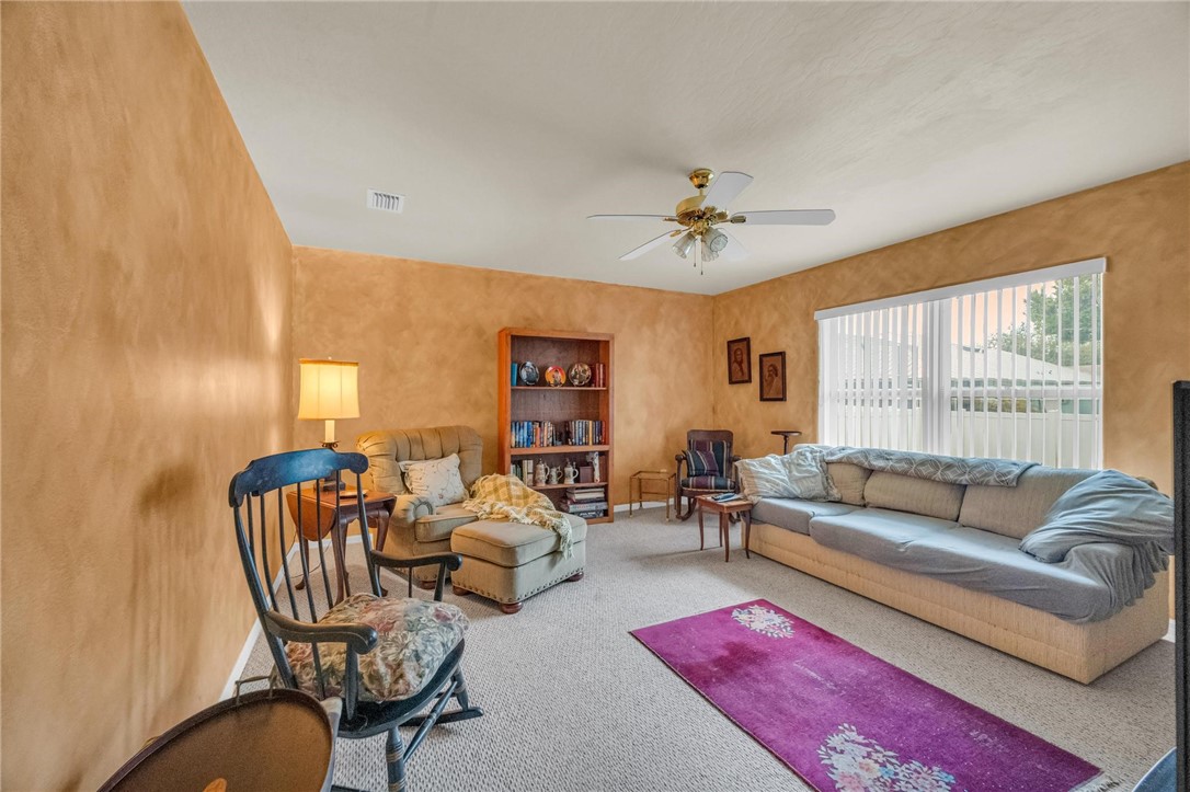 1641 Laconia Street Sebastian, FL 32958 - Photo 19 of 32 a living room with furniture and a large window