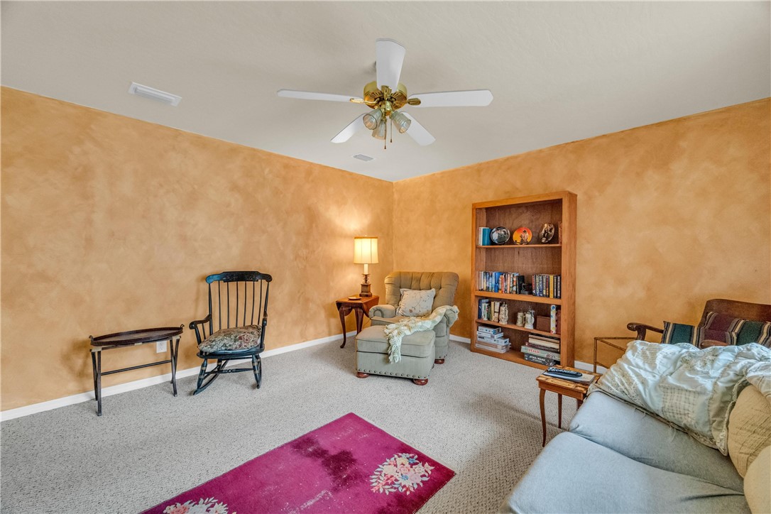 1641 Laconia Street Sebastian, FL 32958 - Photo 20 of 32 a living room with furniture and a piano
