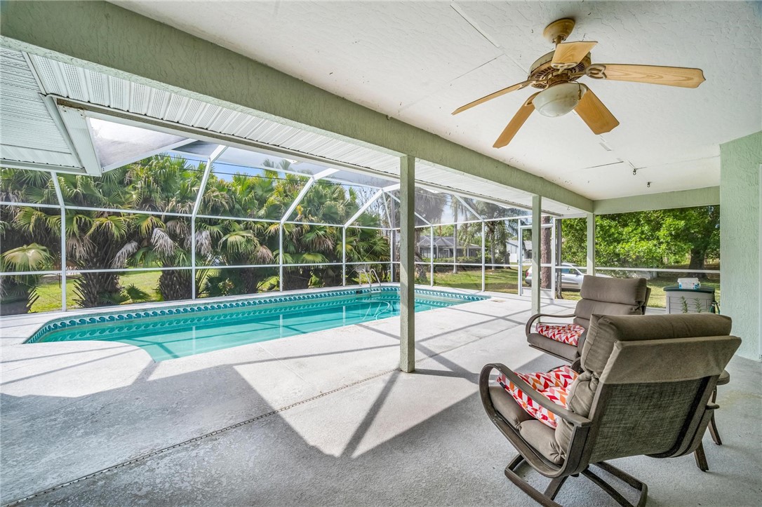 1641 Laconia Street Sebastian, FL 32958 - Photo 30 of 32 a living room with furniture and a large window