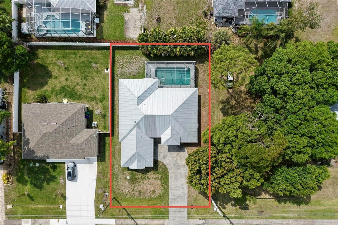 1641 Laconia Street Sebastian, FL 32958 - Photo 32 of 32 an aerial view of a house with outdoor space