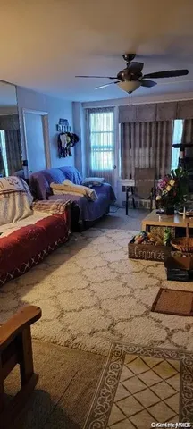 a view of a backyard with table and chairs