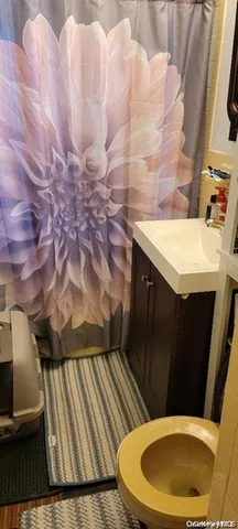 a kitchen with stainless steel appliances granite countertop a sink a stove and a microwave