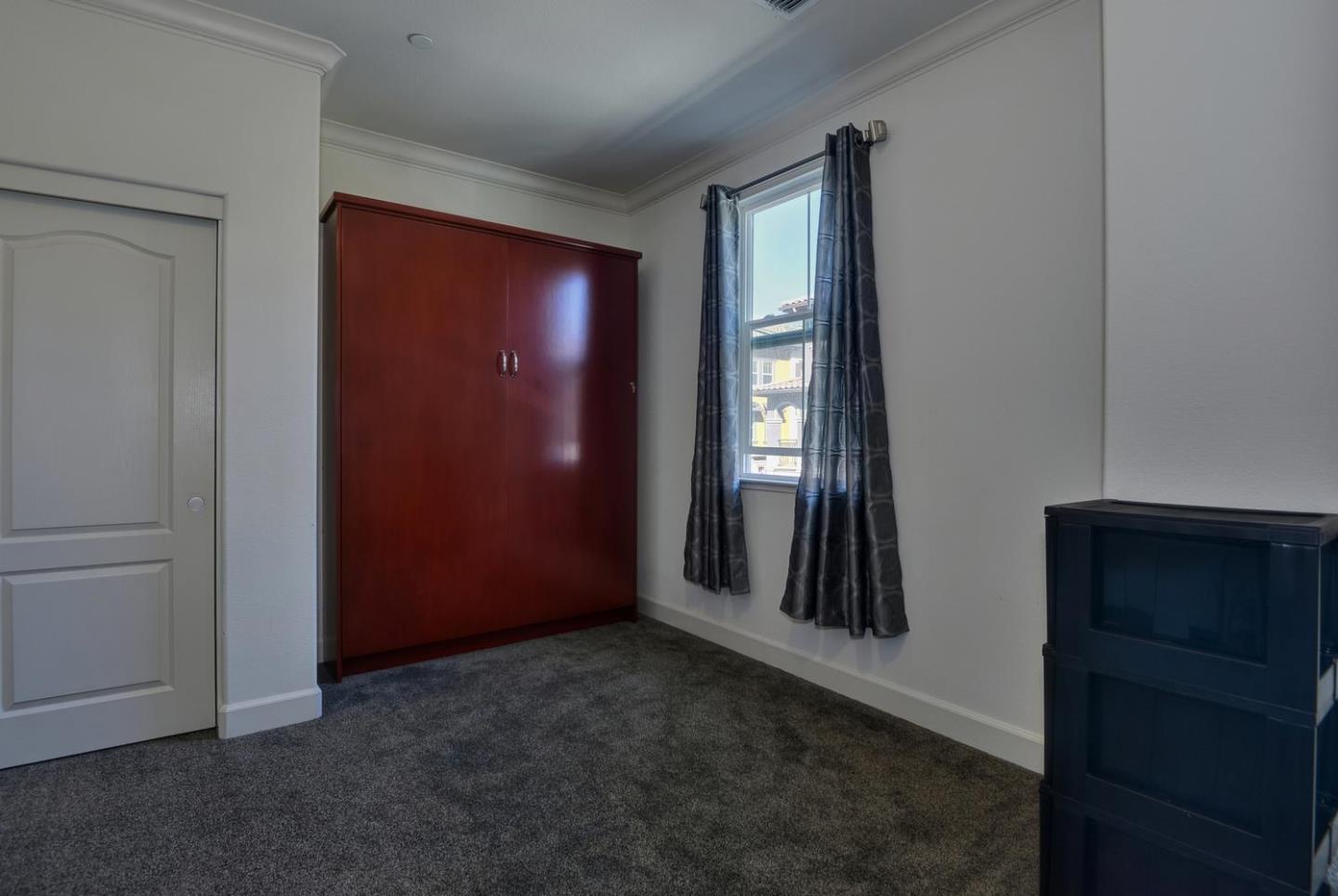 2870 Monroe Terrace San Jose, CA 95128 - Photo 15 of 28 an empty room with windows and closet