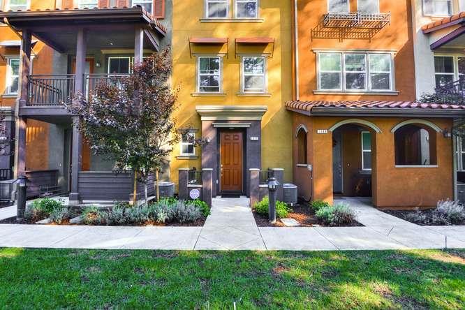2870 Monroe Terrace San Jose, CA 95128 - Photo 4 of 28 a front view of a house with garage and outdoor seating