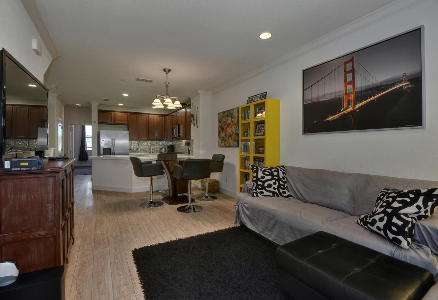 2870 Monroe Terrace San Jose, CA 95128 - Photo 5 of 28 a living room with furniture and a flat screen tv