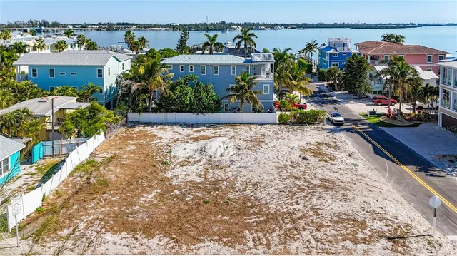 a view of a street with a bunch of flowers