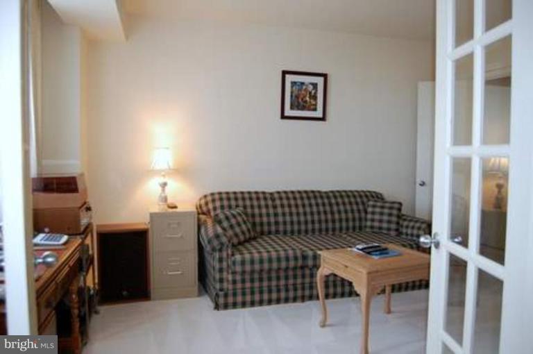 5501 Seminary Road, Unit 1907S Falls Church, VA 22041 - Photo 3 of 21 a bedroom with a bed and furniture