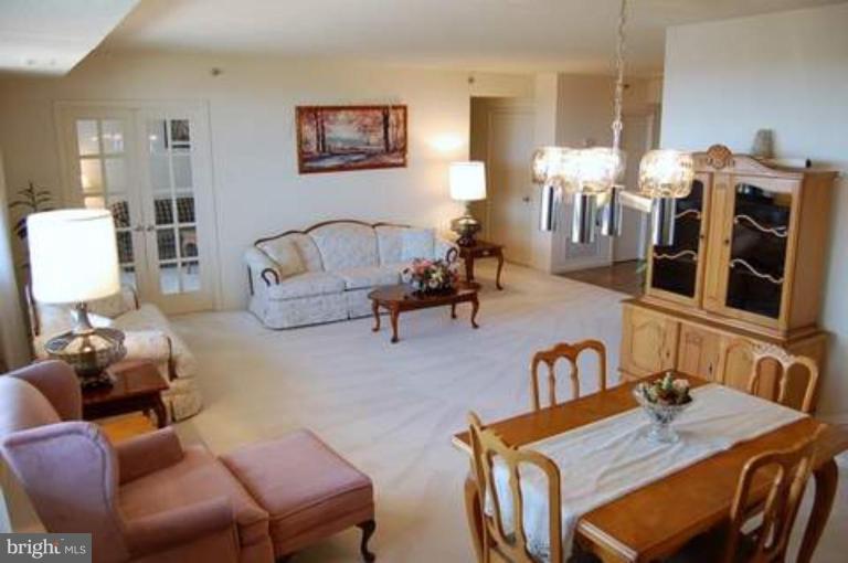 5501 Seminary Road, Unit 1907S Falls Church, VA 22041 - Photo 6 of 21 a living room with furniture and wooden floor