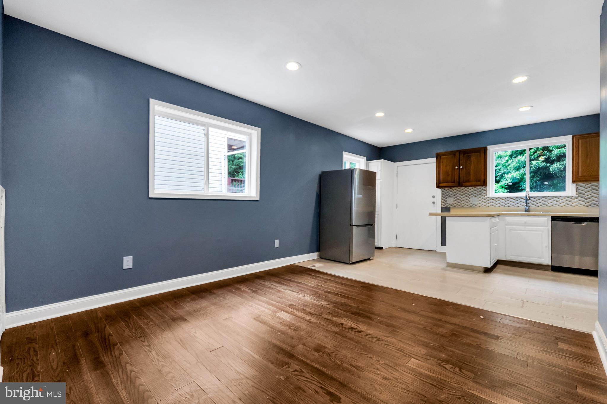 14 West Providence Road Lansdowne, PA 19050 - Photo 17 of 22 a view of kitchen with stainless steel appliances granite countertop refrigerator sink and stove