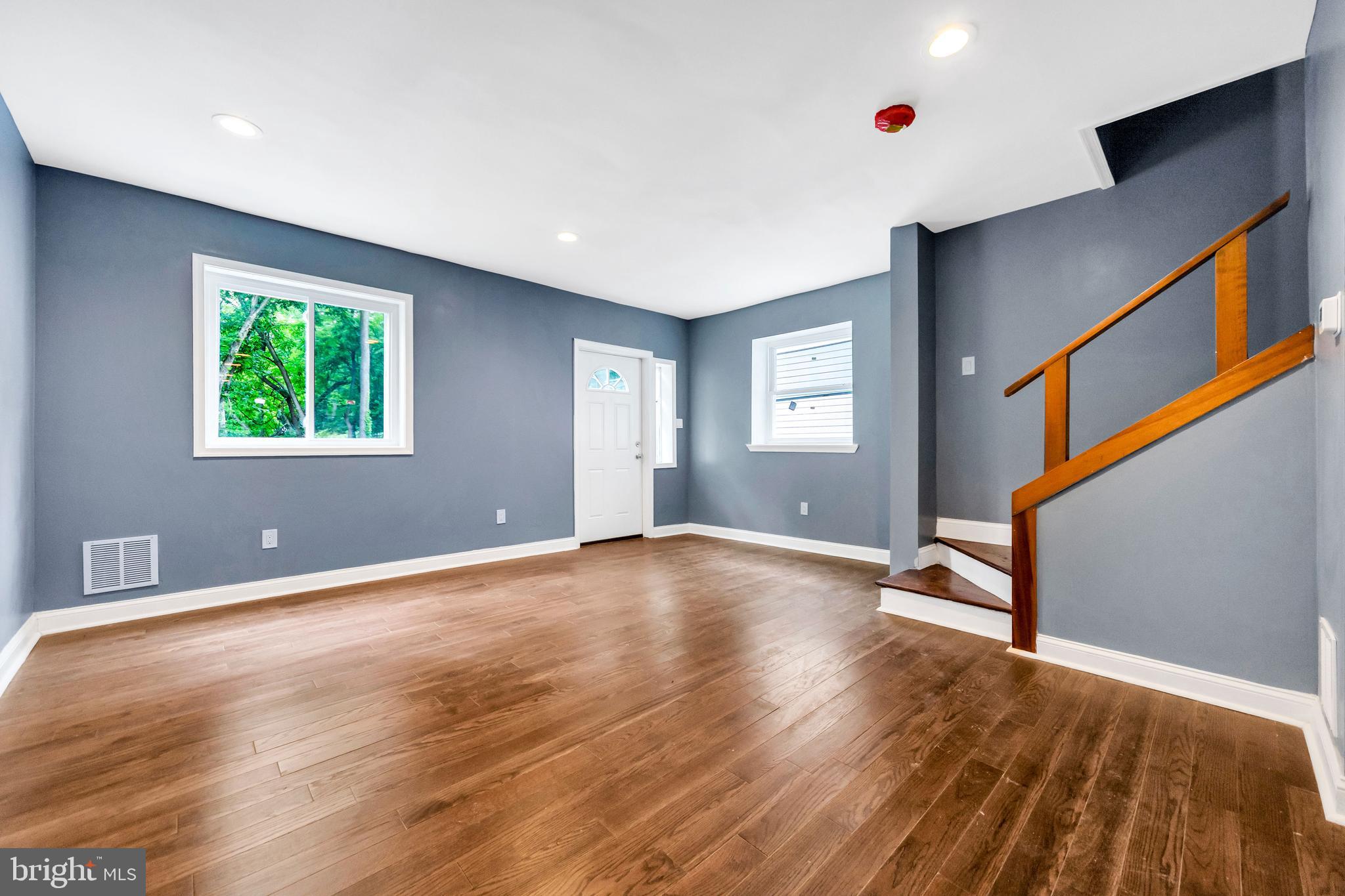 14 West Providence Road Lansdowne, PA 19050 - Photo 18 of 22 a view of an empty room with wooden floor and a window