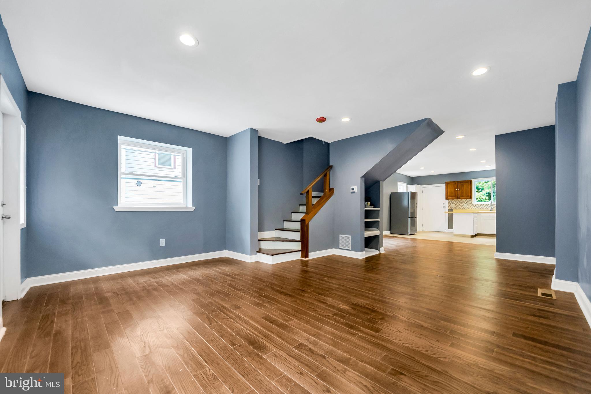 14 West Providence Road Lansdowne, PA 19050 - Photo 19 of 22 a view of an empty room with wooden floor and a window